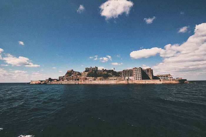 Behold the haunting decay of gunkanjima japans battleship island